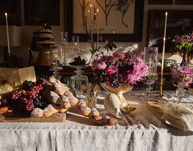 A holiday party with solid ice champagne buckets and ornamental bugs